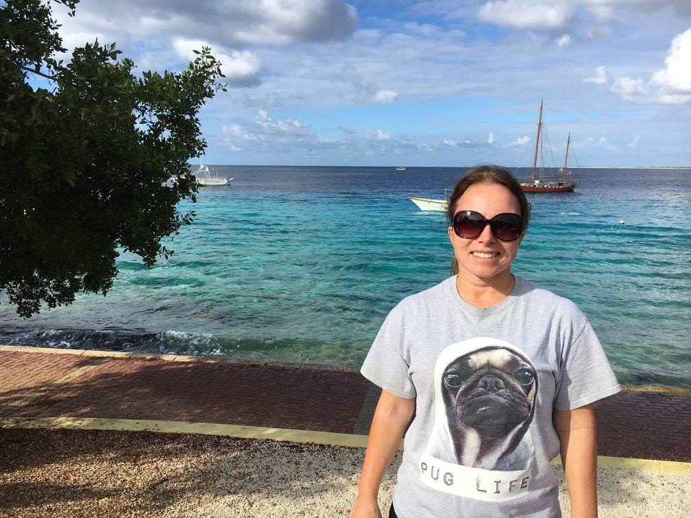 Bonaire, just pick a place on the beach and dive. Remember the Lion Fish Sandwiches! So good!,, the iguana's were like trying to grab them from you.